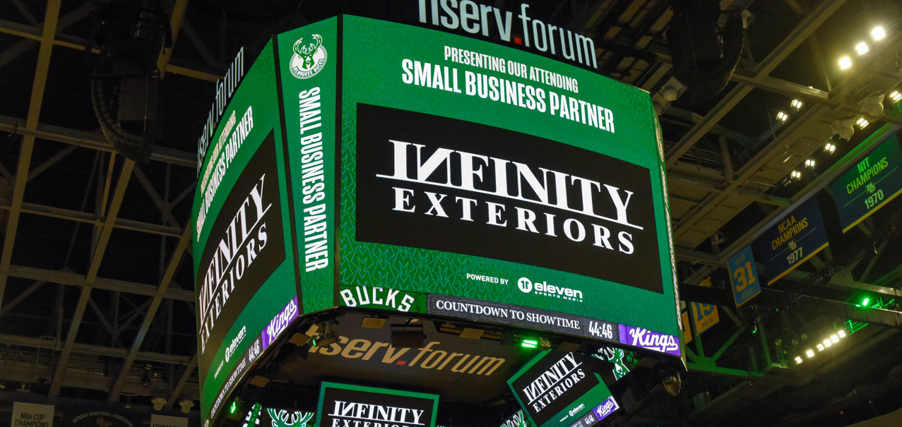 Infinity Exteriors logo on fiserv.forum jumbo screen